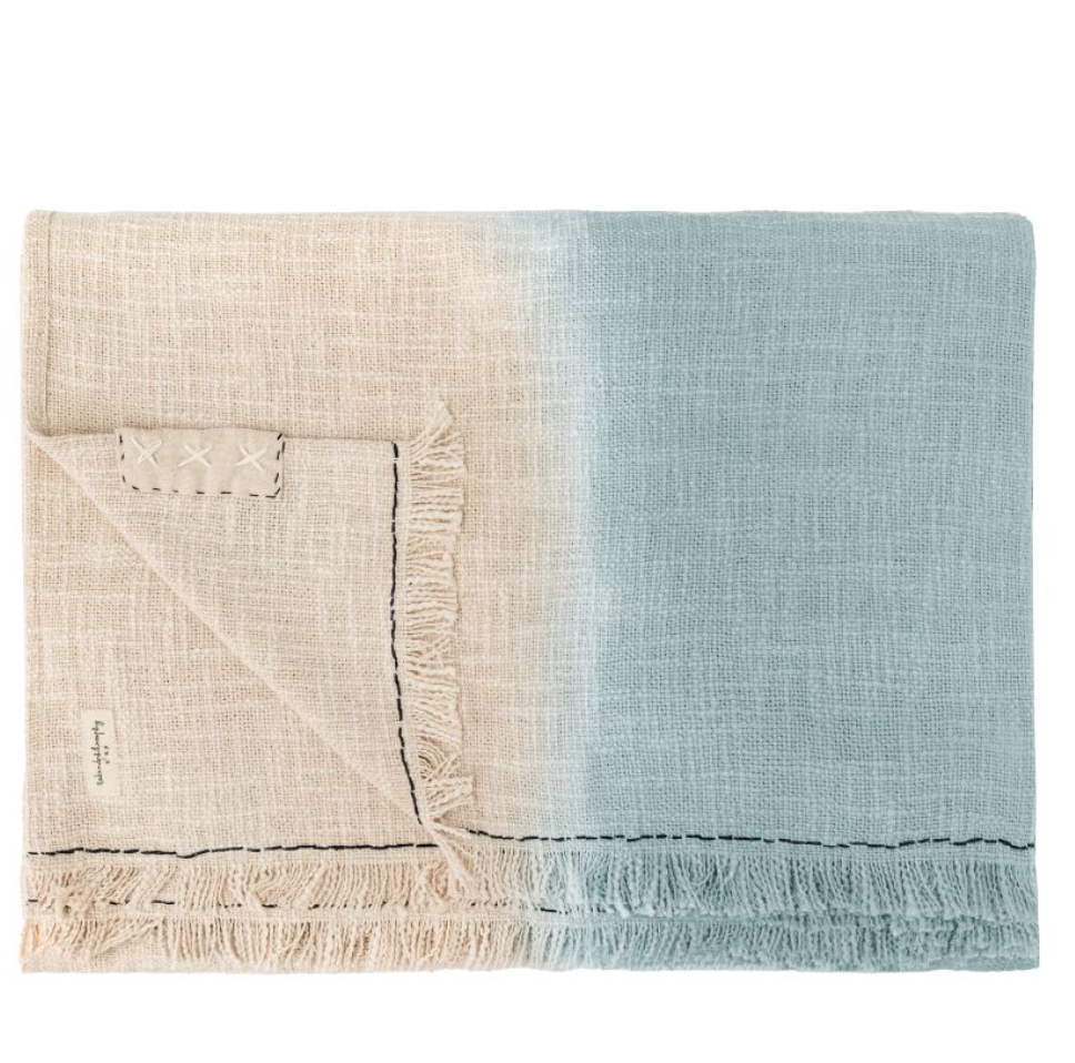 plaid aqua et surpiqure noire étiquette XXX et frange